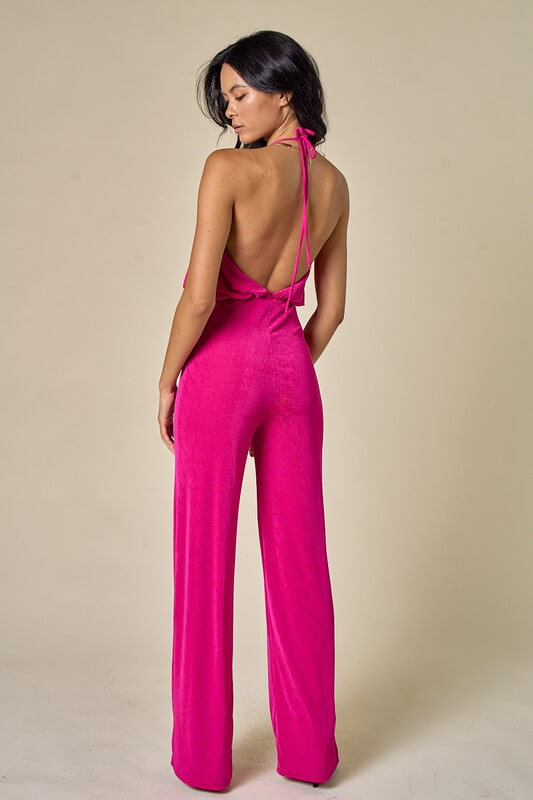 2023 Bump-Friendly Wedding Guest: pink stretchy backless jumpsuit