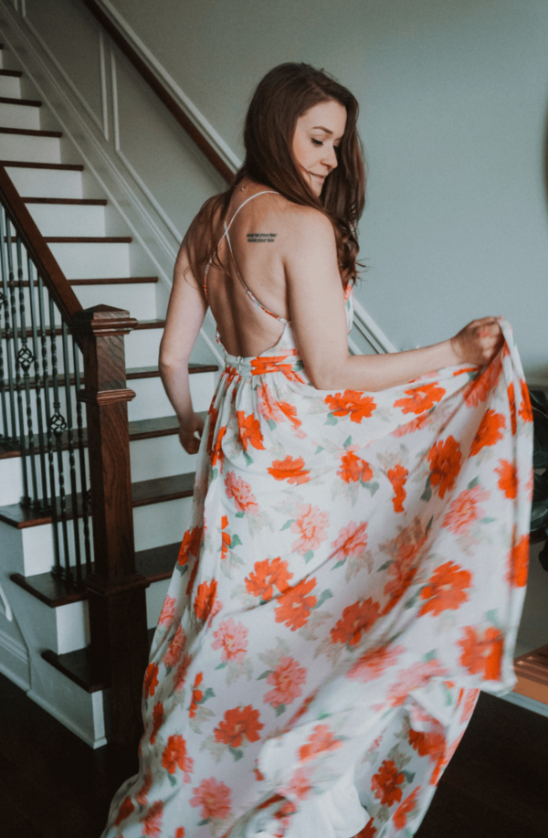 Floral maxi with a deep v neck and an open back