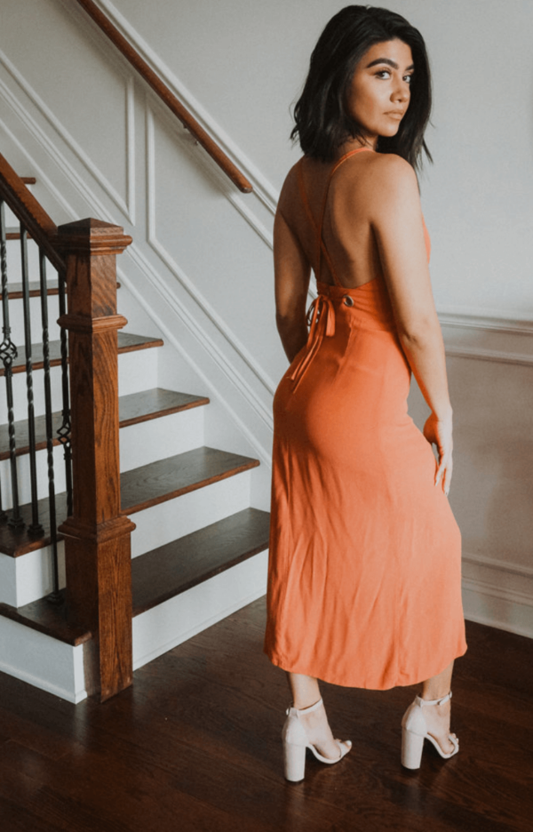 Orange cotton midi with a surpice top and a side slit