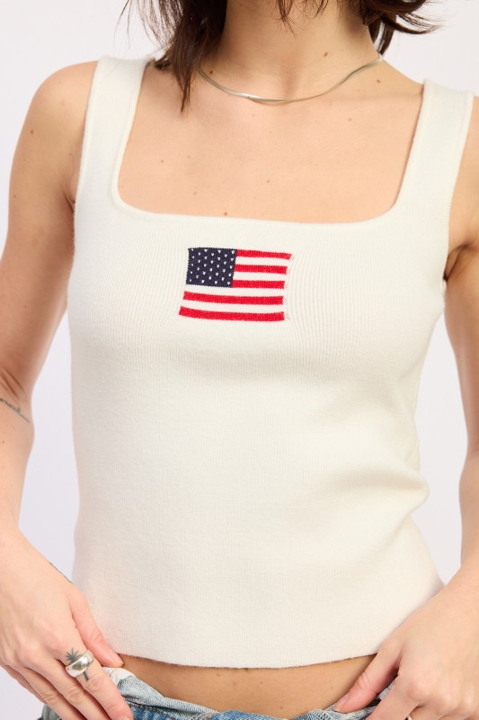 woman wearing white american flag ribbed square neck tank top with denim shorts