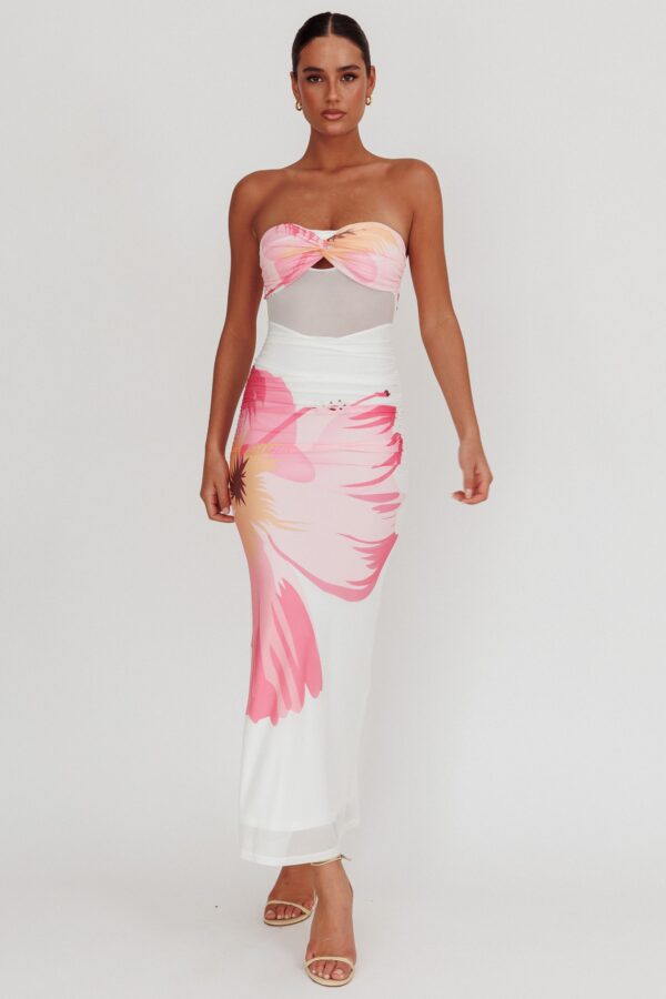 Pink and white floral twist knot maxi dress styled with nude heels for summer vacation outfits