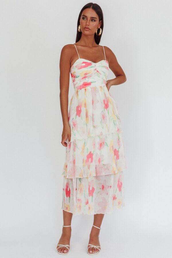 White floral tiered maxi dress with flowy silhouette and ruched bodice, perfect for summer outfits, vacation looks, and wedding guest dresses
