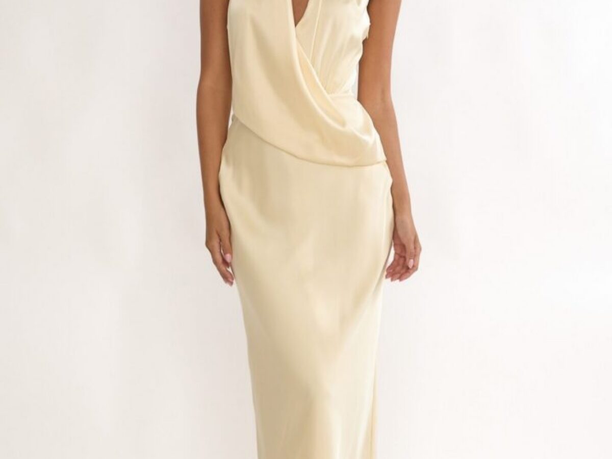butter yellow silk dress Charlita Maxi The butter yellow satin cowl neck drape maxi dress is cut to create an effortless line Steve Madden: Lara Dress -