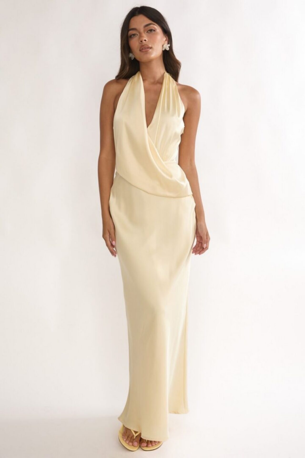 butter yellow halter dress ADELA MAXI | CULT MIA hip seam and paneling at the skirt for volume and movement Butter Yellow Maxi Dress