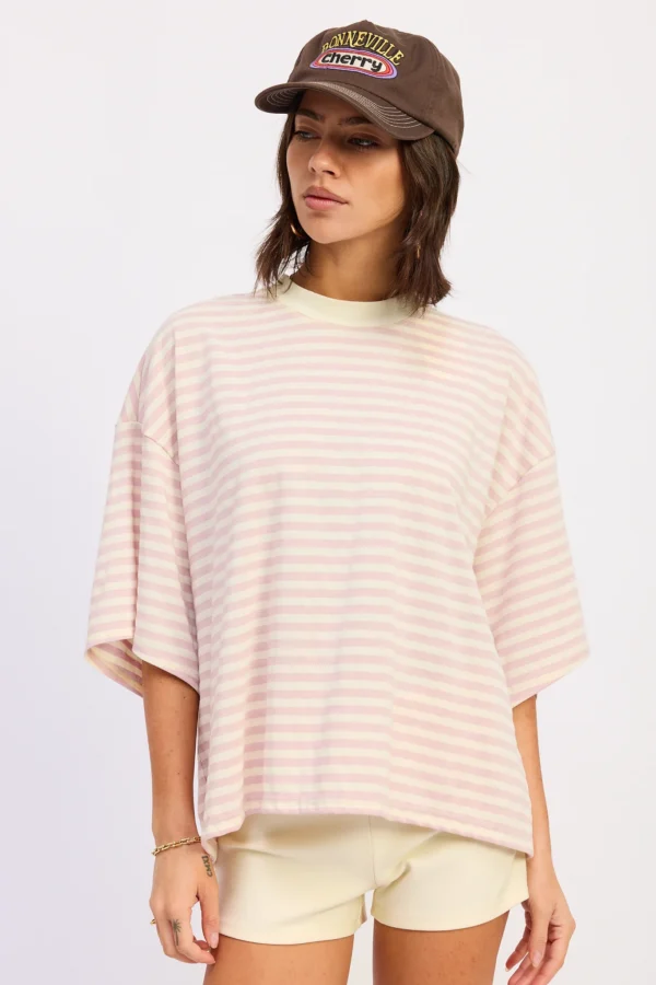 Women's pink and ivory oversized striped tee shirt with relaxed fit and dropped shoulders.