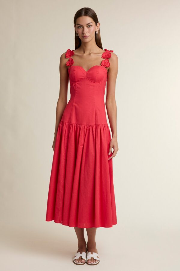 Women's red summer midi dress with floral appliqué straps.
