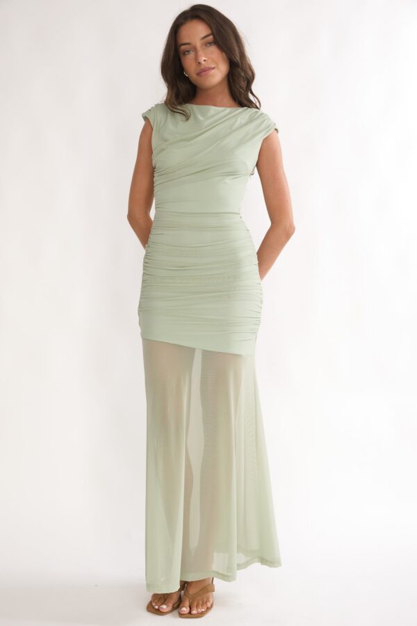 Back view of sage spring and summer maxi dress with sheer flowing hem.