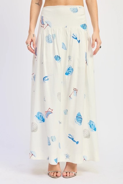 White coastal print maxi skirt with flowy silhouette for beach vacations and summer outfits
