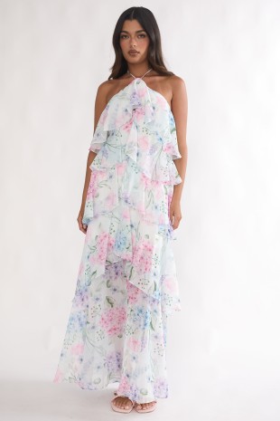 Blue floral halter ruffle tiered maxi dress for women with romantic pastel print and flowing layered skirt.