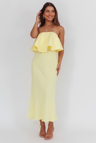Butter yellow strapless ruffle maxi dress for women with fitted silhouette, elegant spring wedding guest dress front view.