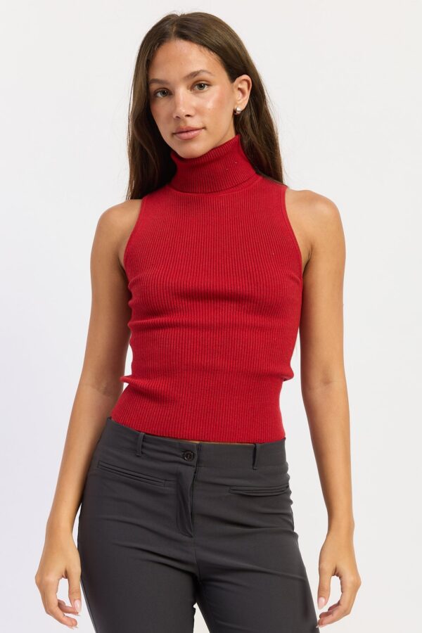 Deep Red top featuring a sleeveless cut, polished turtleneck, smooth sweater knit, and close streamlined silhouette