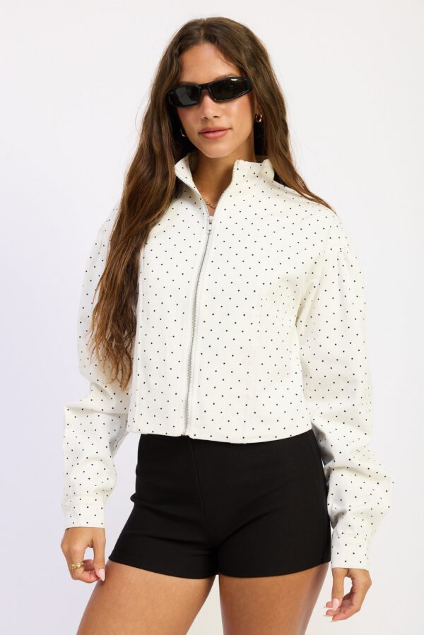 Off-white cotton jacket with black polka dots and zippered pocket
