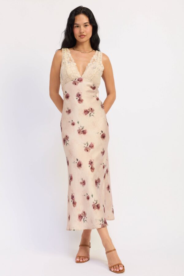 Model wearing pale blush satin floral lace midi dress; a floral satin finish with contrasting lace trim and a midi length