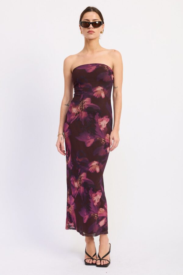 Model wearing burgundy purple strapless tube midi dress; a strapless tube silhouette and midi-length hem