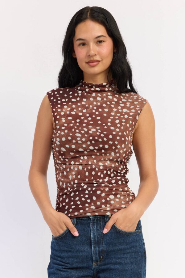 Brown spotted mesh sleeveless top with mock neck and ruched fitted sides