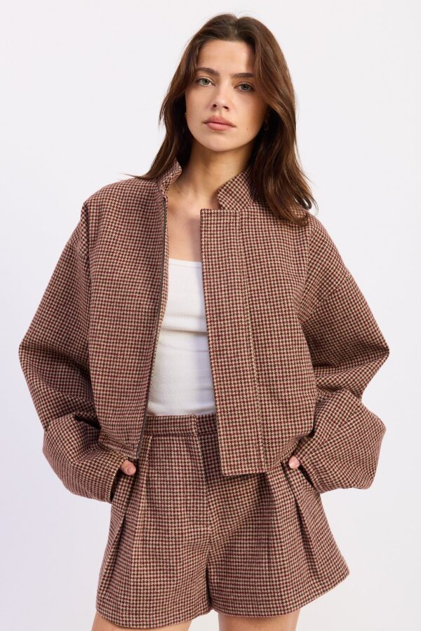 Model wearing red brown plaid high collar wool blend jacket