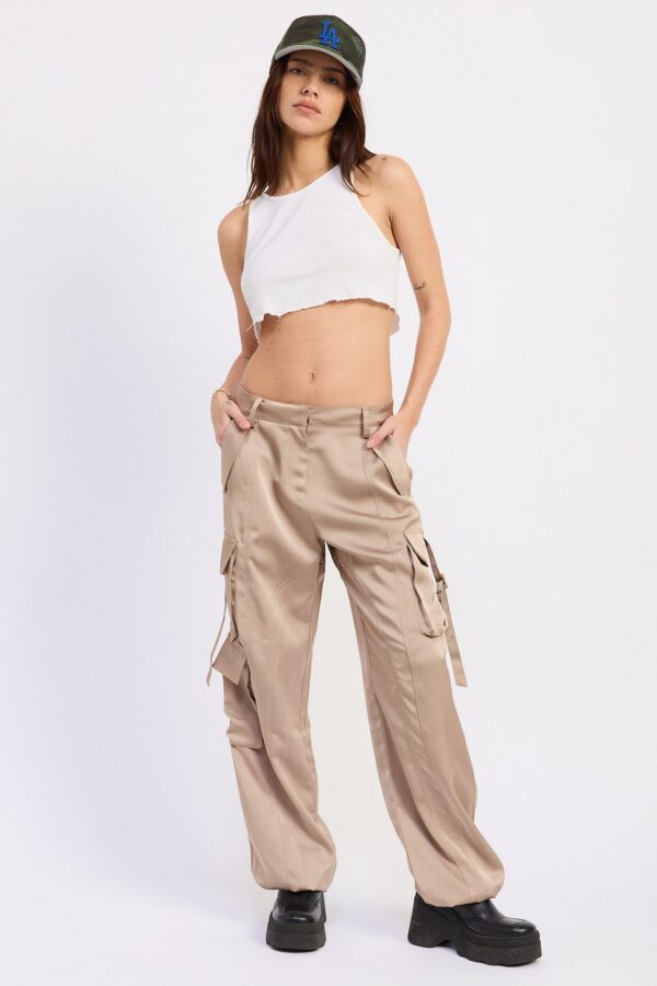 Styled view of beige satin cargo pants